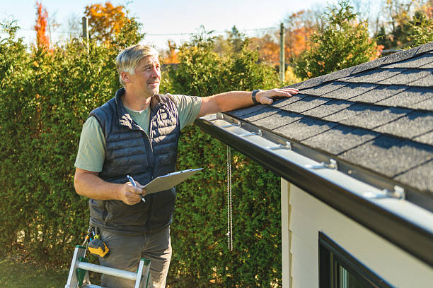 Professional Storm Damage Roof Repair technician working in Buckeye, AZ